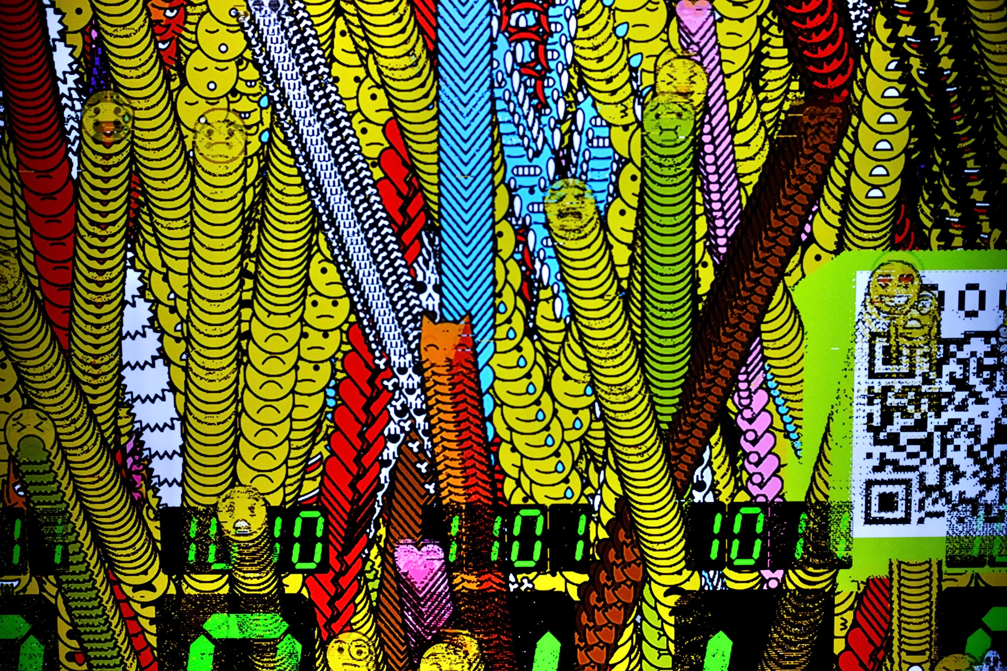 A pixelflut running at the bar.
We can see several vertical series of overlapping, colorful smilies.